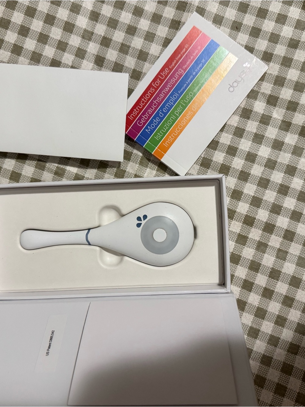 White & Gray Handheld Skin Device - Daye